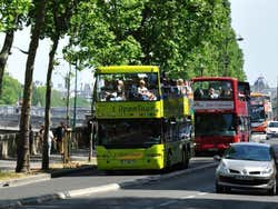 Hop on hop off buses, near the River Seine